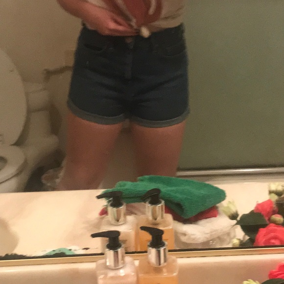 High waisted, medium wash denim shorts. - Picture 4 of 6
